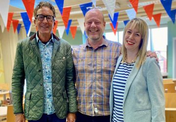 Adam Holloway, director of Cheshire Dance has his arms around Peter Mearns and Holly Aston, new Co-Chairs of Cheshire Dance